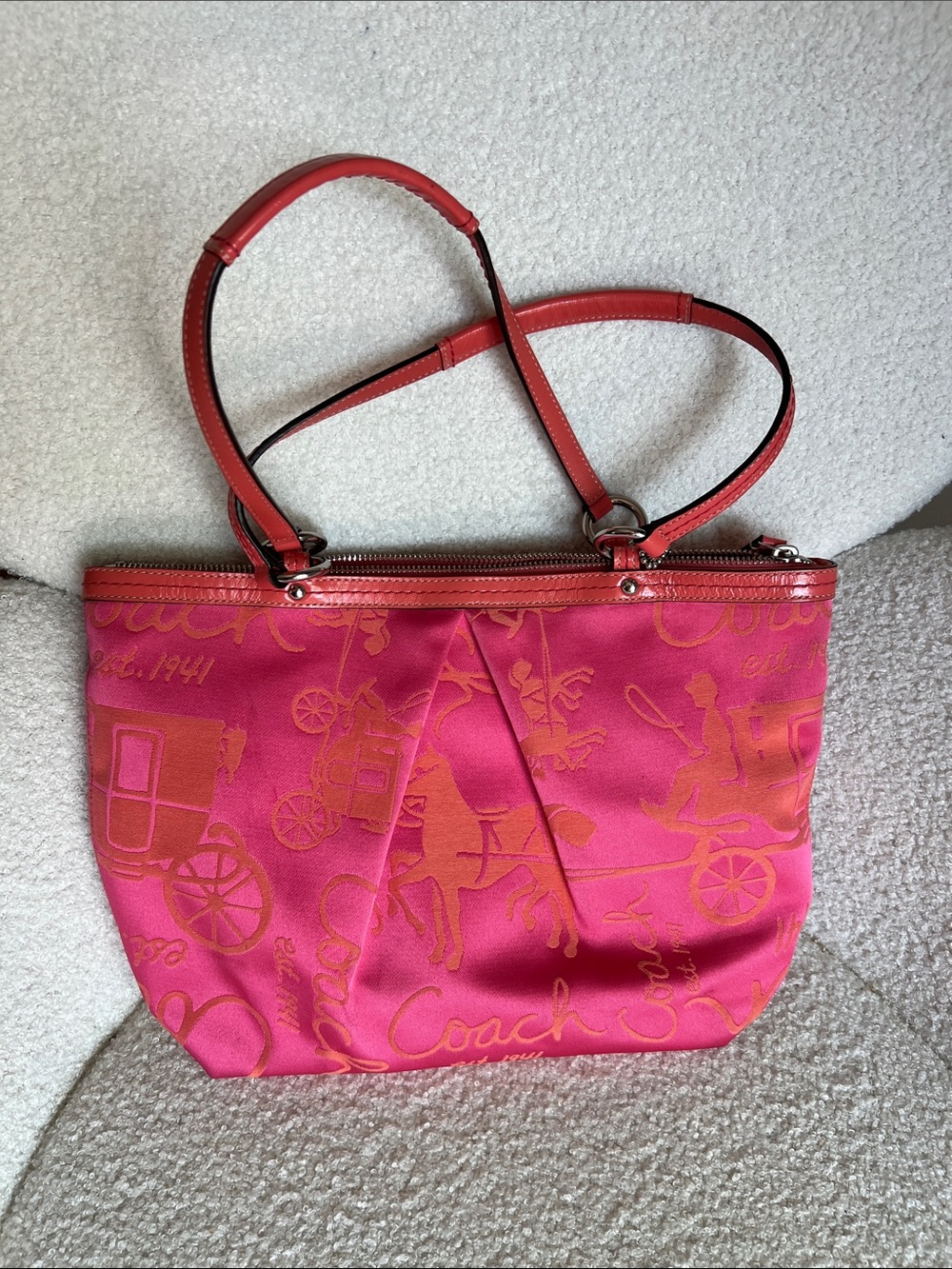 This is a Coach F14482 Pink Graphic Tote Bag with Coral Horse & Carriage motif